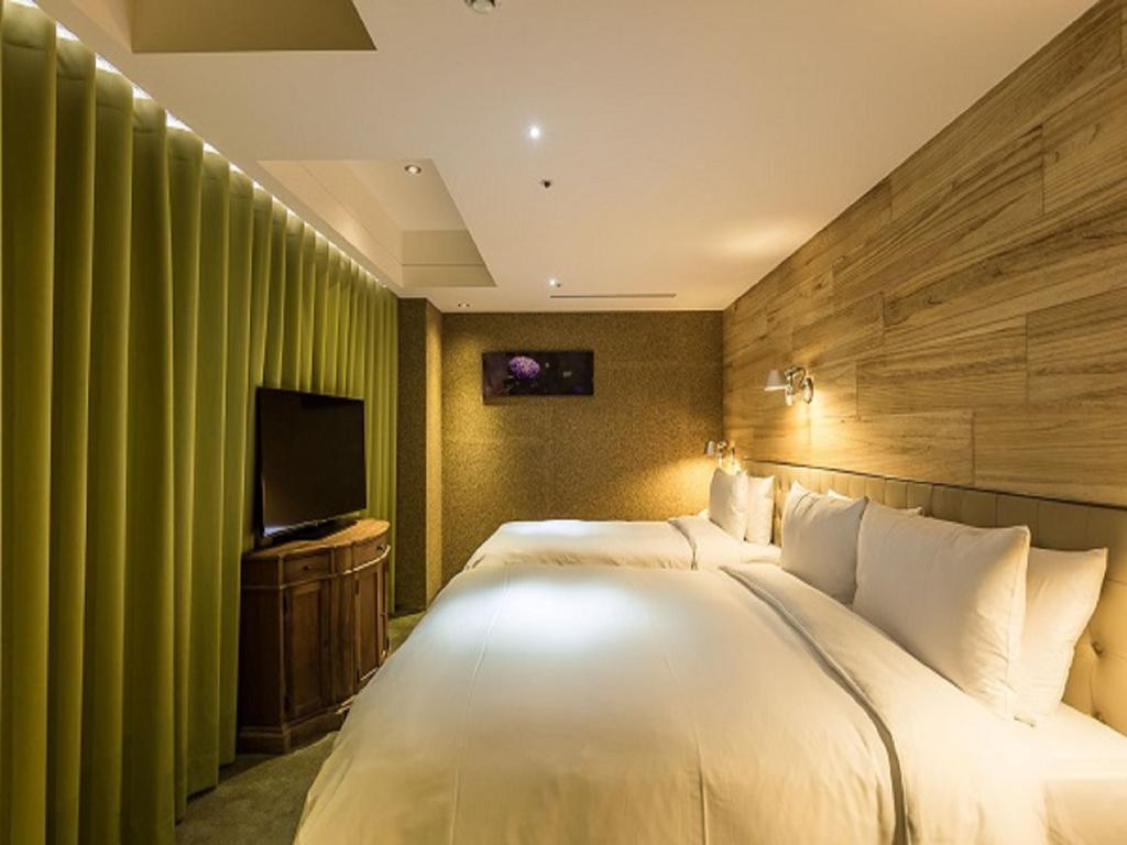 Inhouse Hotel Тайджун Екстериор снимка